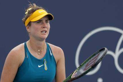 Mar 24, 2022; Miami Gardens, FL, USA; Elina Svitolina (UKR) prepares to receive serve against Heather Watson (GBR) (not pictured) in a second round women's singles match in the Miami Open at Hard Rock Stadium. Mandatory Credit: Geoff Burke-USA TODAY Sports