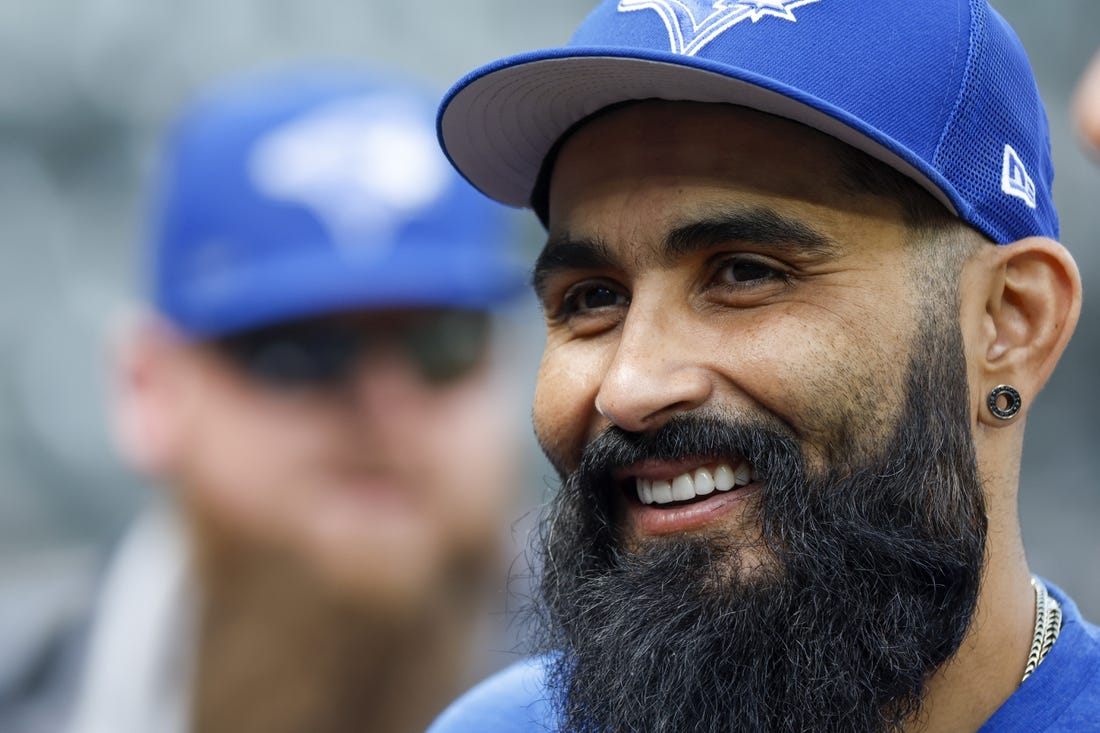 Jul 8, 2022; Seattle, Washington, USA; Toronto Blue Jays relief pitcher Sergio Romo (54) talks with teammates before batting practice against the Seattle Mariners at T-Mobile Park. Mandatory Credit: Joe Nicholson-USA TODAY Sports