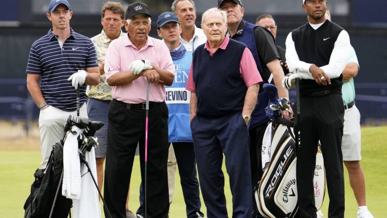 Jul 11, 2022; St. Andrews, SCT; Rory McIlroy, Lee Trevino, Jack Nicklaus, and Tiger Woods during the R&A Celebration of Champions four-hole challenge at the 150th Open Championship golf tournament at St. Andrews Old Course. Mandatory Credit: Rob Schumacher-USA TODAY Sports