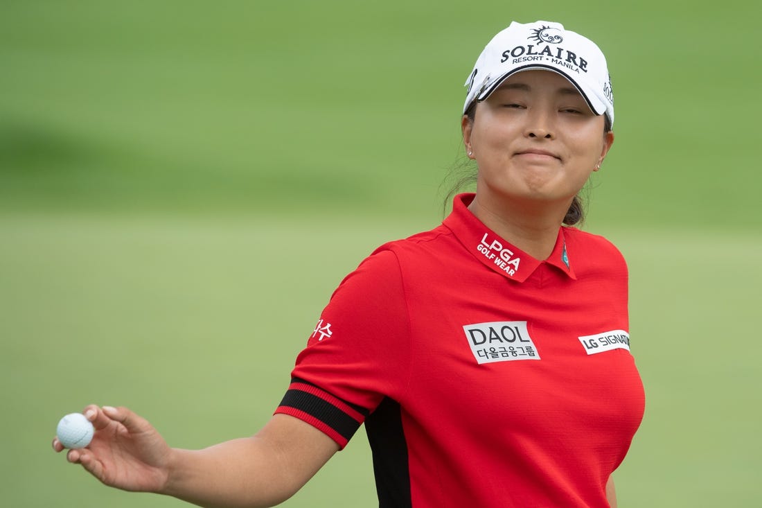 Aug 26, 2022; Ottawa, Ontario, CAN; Jin Young Ko salutes the crowd after completing her 18th hole during the second round of the CP Women's Open golf tournament. Mandatory Credit: Marc DesRosiers-USA TODAY Sports