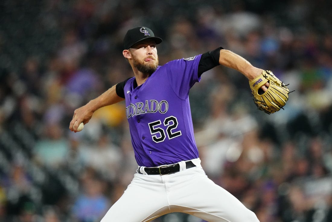 Sep 6, 2022; Denver, Colorado, USA; Colorado Rockies relief pitcher Daniel Bard (52) pitches in the eleventh inning against the Milwaukee Brewers at Coors Field. Mandatory Credit: Ron Chenoy-USA TODAY Sports