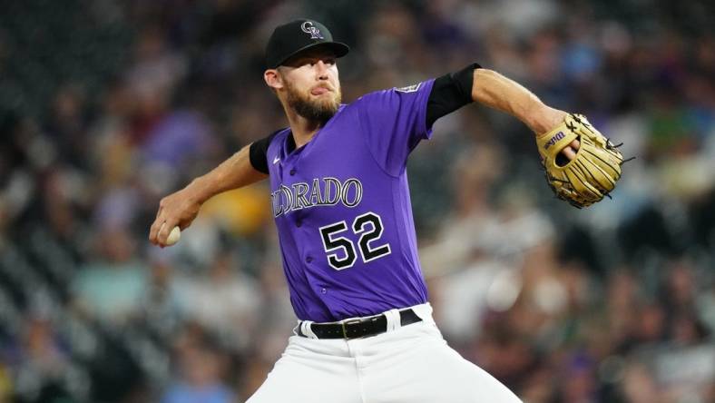 Sep 6, 2022; Denver, Colorado, USA; Colorado Rockies relief pitcher Daniel Bard (52) pitches in the eleventh inning against the Milwaukee Brewers at Coors Field. Mandatory Credit: Ron Chenoy-USA TODAY Sports