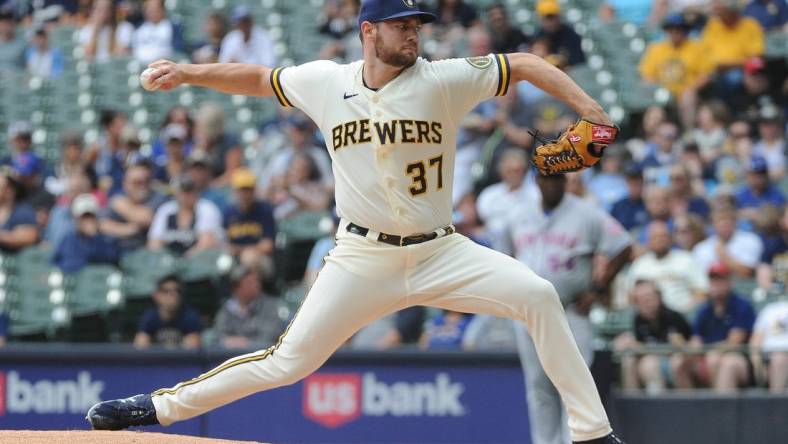 Sep 21, 2022; Milwaukee, Wisconsin, USA;  Milwaukee Brewers starting pitcher Adrian Houser (37) delivers a pitch against the New York Mets in the first inning at American Family Field. Mandatory Credit: Michael McLoone-USA TODAY Sports