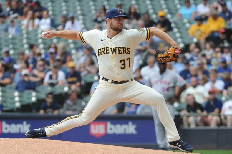Sep 21, 2022; Milwaukee, Wisconsin, USA;  Milwaukee Brewers starting pitcher Adrian Houser (37) delivers a pitch against the New York Mets in the first inning at American Family Field. Mandatory Credit: Michael McLoone-USA TODAY Sports