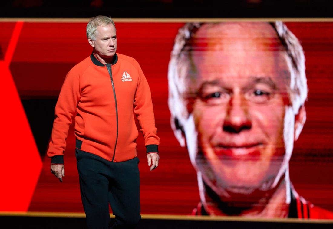 Sep 23, 2022; London, United Kingdom;  Patrick McEnroe, vice captain of Team World arrives on court for the opening of the Laver Cup tennis event.  Mandatory Credit: Peter van den Berg-USA TODAY Sports