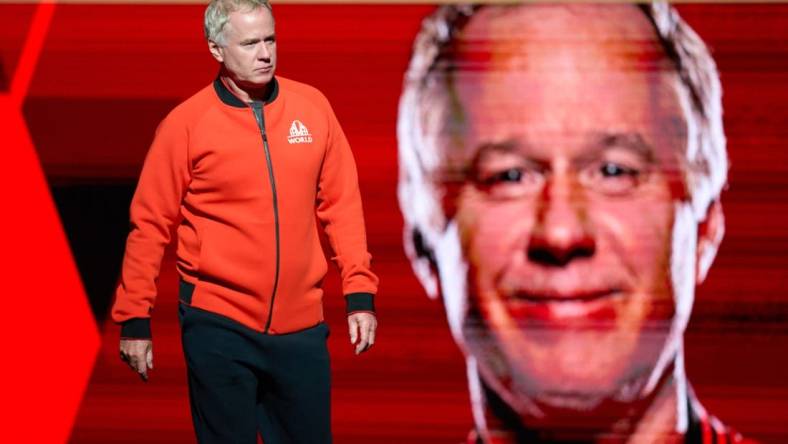 Sep 23, 2022; London, United Kingdom;  Patrick McEnroe, vice captain of Team World arrives on court for the opening of the Laver Cup tennis event.  Mandatory Credit: Peter van den Berg-USA TODAY Sports