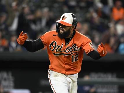 Sep 24, 2022; Baltimore, Maryland, USA;  Baltimore Orioles second baseman Rougned Odor (12) reacts after hitting a home run against the Houston Astros during the ninth inning at Oriole Park at Camden Yards. Mandatory Credit: James A. Pittman-USA TODAY Sports