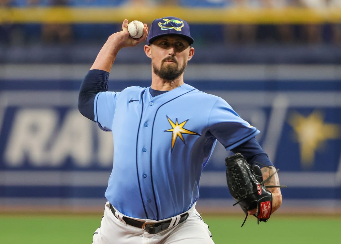 Sep 25, 2022; St. Petersburg, Florida, USA; Tampa Bay Rays relief pitcher Shawn Armstrong (64) trows a pitch during the seventh inning against the Toronto Blue Jays at Tropicana Field. Mandatory Credit: Mike Watters-USA TODAY Sports
