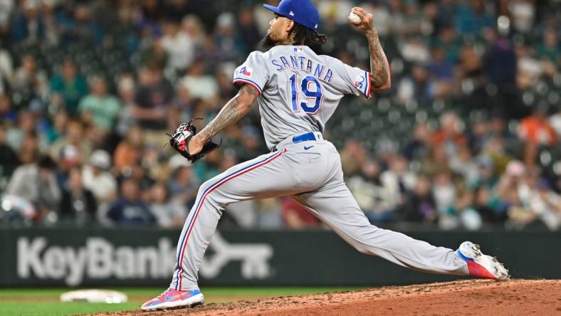 Sep 27, 2022; Seattle, Washington, USA; Texas Rangers relief pitcher Dennis Santana (19) pitches to the Seattle Mariners during the sixth inning at T-Mobile Park. Mandatory Credit: Steven Bisig-USA TODAY Sports