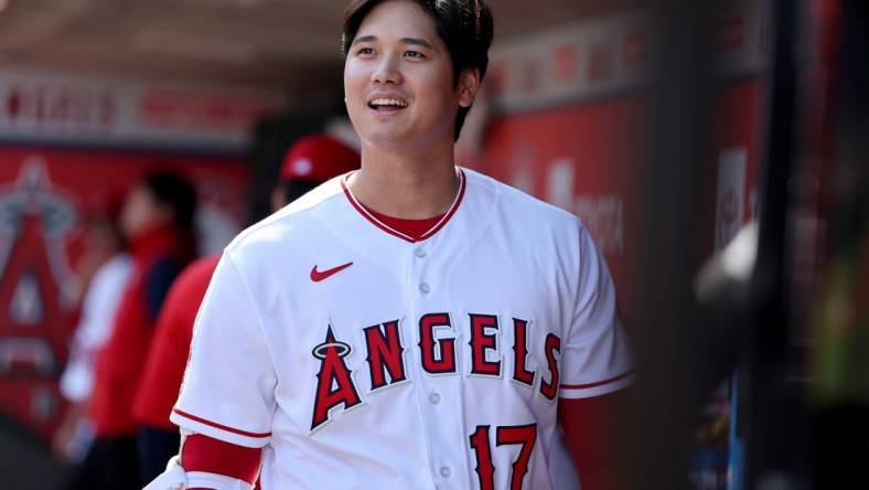 Oct 2, 2022; Anaheim, California, USA;  Los Angeles Angels designated hitter Shohei Ohtani (17) smiles in the dugout before the game against the Texas Rangers at Angel Stadium. Mandatory Credit: Kiyoshi Mio-USA TODAY Sports