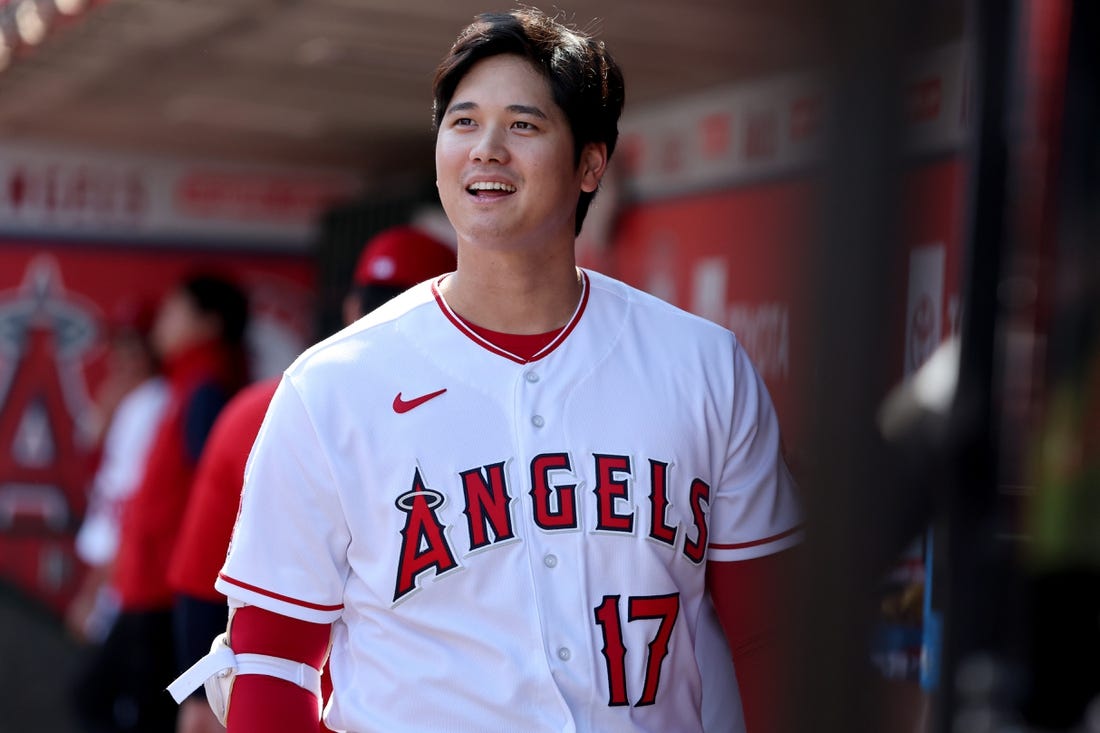 Oct 2, 2022; Anaheim, California, USA;  Los Angeles Angels designated hitter Shohei Ohtani (17) smiles in the dugout before the game against the Texas Rangers at Angel Stadium. Mandatory Credit: Kiyoshi Mio-USA TODAY Sports