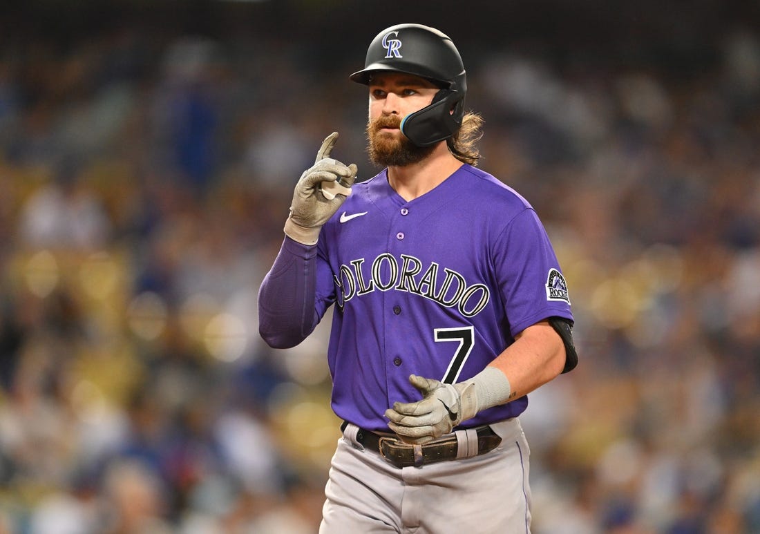 Oct 4, 2022; Los Angeles, California, USA;  Colorado Rockies second baseman Brendan Rodgers (7) crosses the plate after a solo home run in the first inning off Los Angeles Dodgers starting pitcher Julio Urias (7) at Dodger Stadium. Mandatory Credit: Jayne Kamin-Oncea-USA TODAY Sports