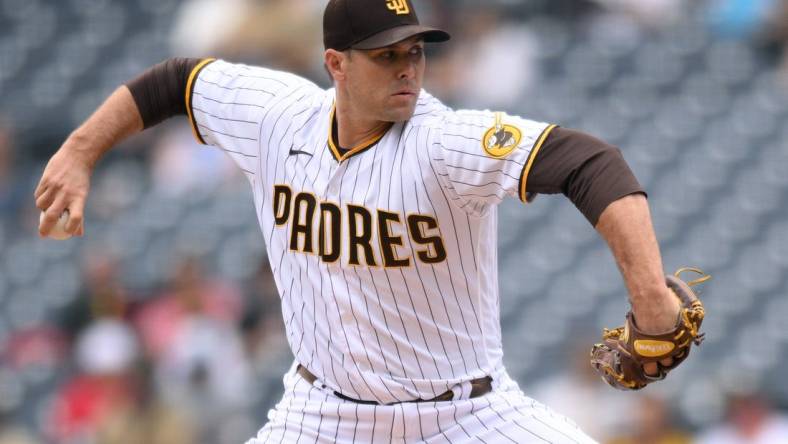 Oct 5, 2022; San Diego, California, USA; San Diego Padres starting pitcher Craig Stammen (34) throws a pitch against the San Francisco Giants during the first inning at Petco Park. Mandatory Credit: Orlando Ramirez-USA TODAY Sports