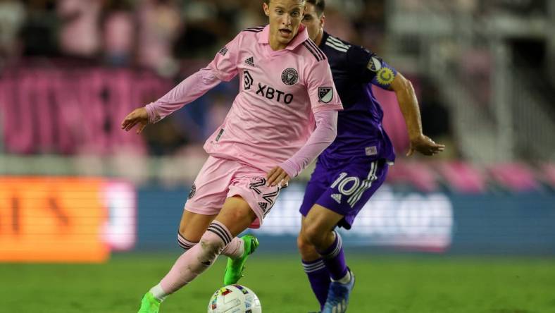 Oct 5, 2022; Fort Lauderdale, Florida, USA;  Inter Miami midfielder Bryce Duke (22) controls the ball from Orlando City midfielder Mauricio Pereyra (10) in the first half at DRV PNK Stadium. Mandatory Credit: Nathan Ray Seebeck-USA TODAY Sports