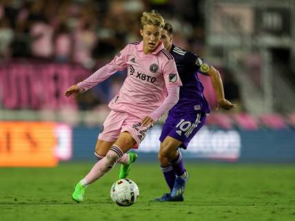 Oct 5, 2022; Fort Lauderdale, Florida, USA;  Inter Miami midfielder Bryce Duke (22) controls the ball from Orlando City midfielder Mauricio Pereyra (10) in the first half at DRV PNK Stadium. Mandatory Credit: Nathan Ray Seebeck-USA TODAY Sports