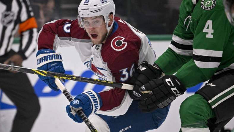 Oct 3, 2022; Dallas, Texas, USA; Colorado Avalanche left wing Anton Blidh (36) in action during the game between the Dallas Stars and the Colorado Avalanche at the American Airlines Center. Mandatory Credit: Jerome Miron-USA TODAY Sports