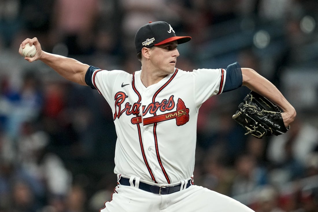 Oct 12, 2022; Atlanta, Georgia, USA; Atlanta Braves starting pitcher Kyle Wright (30) throws against the Philadelphia Phillies in the first inning during game two of the NLDS for the 2022 MLB Playoffs at Truist Park. Mandatory Credit: Dale Zanine-USA TODAY Sports