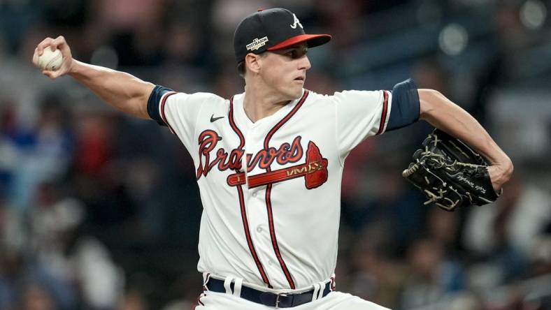 Oct 12, 2022; Atlanta, Georgia, USA; Atlanta Braves starting pitcher Kyle Wright (30) throws against the Philadelphia Phillies in the first inning during game two of the NLDS for the 2022 MLB Playoffs at Truist Park. Mandatory Credit: Dale Zanine-USA TODAY Sports