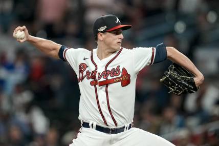 Oct 12, 2022; Atlanta, Georgia, USA; Atlanta Braves starting pitcher Kyle Wright (30) throws against the Philadelphia Phillies in the first inning during game two of the NLDS for the 2022 MLB Playoffs at Truist Park. Mandatory Credit: Dale Zanine-USA TODAY Sports