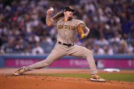 Oct 11, 2022; Los Angeles, California, USA; San Diego Padres pitcher Mike Clevinger (52) throws in the first inning of game one of the NLDS for the 2022 MLB Playoffs against the Los Angeles Dodgers at Dodger Stadium. Mandatory Credit: Kirby Lee-USA TODAY Sports