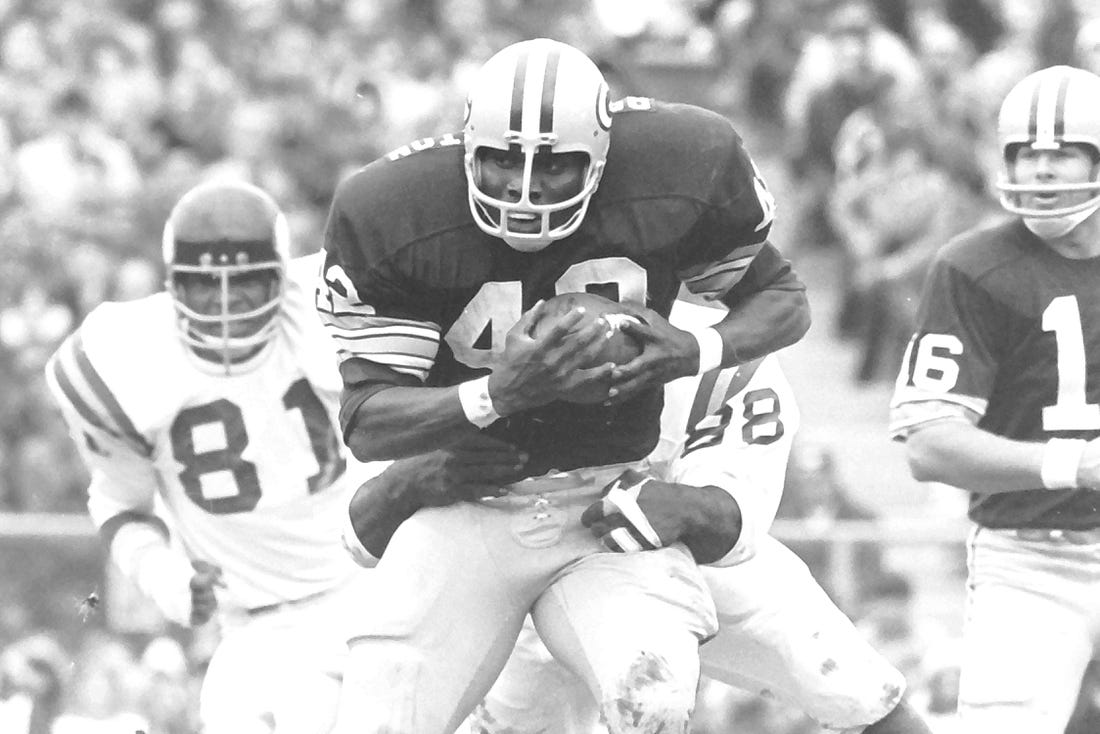 Green Bay Packers' John Brockington (42) runs the ball against the Minnesota Vikings at Lambeau Field on Oct. 29, 1972. The Vikings defeated the Packers 27-13, one of only four regular-season losses for Green Bay.