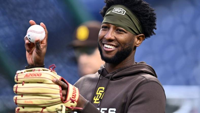 Oct 22, 2022; Philadelphia, Pennsylvania, USA; San Diego Padres left fielder Jurickson Profar (10) warms up before game four of the NLCS against the Philadelphia Phillies for the 2022 MLB Playoffs at Citizens Bank Park. Mandatory Credit: Kyle Ross-USA TODAY Sports