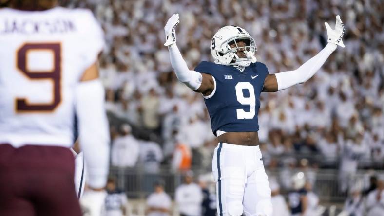 Penn State's Joey Porter Jr. motions to the Nittany Lion faithful after Minnesota is penalized for a second false start in the first quarter at Beaver Stadium on Saturday, Oct. 22, 2022, in State College.

Hes Dr 102222 Whiteout