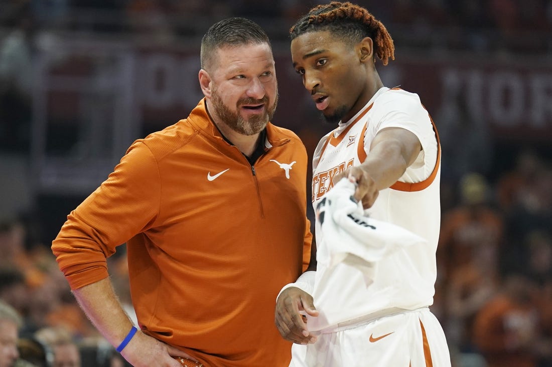 Nov 10, 2022; Austin, Texas, USA; Texas Longhorns head coach Chris Beard talks with guard Arterio Morris (2) during the first half against the Houston Christian Huskies at Moody Center. Mandatory Credit: Scott Wachter-USA TODAY Sports