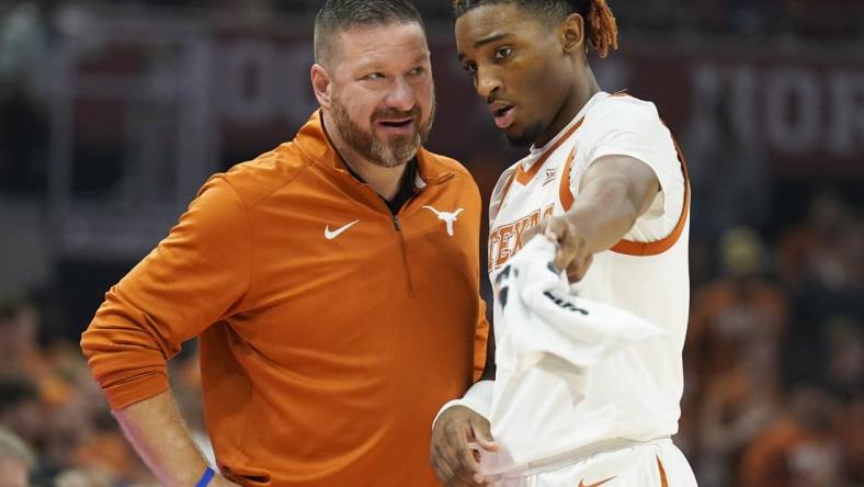 Nov 10, 2022; Austin, Texas, USA; Texas Longhorns head coach Chris Beard talks with guard Arterio Morris (2) during the first half against the Houston Christian Huskies at Moody Center. Mandatory Credit: Scott Wachter-USA TODAY Sports