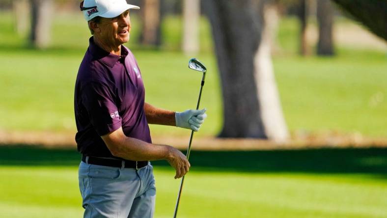 Nov 10, 2022; Phoenix, AZ, USA; David Toms plays his second shot on the ninth hole during round one of the Charles Schwab Cup at Phoenix Country Club. Mandatory Credit: Rob Schumacher-Arizona Republic

Golf Charles Schwab Cup Round 1