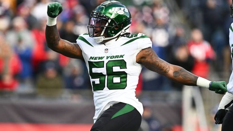 Nov 20, 2022; Foxborough, Massachusetts, USA; New York Jets linebacker Quincy Williams (56) reacts after a sack against the New England Patriots during the first half at Gillette Stadium. Mandatory Credit: Brian Fluharty-USA TODAY Sports