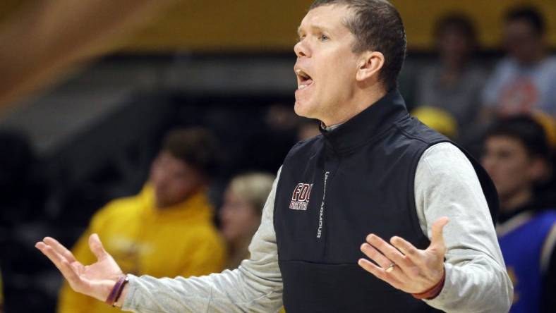 Nov 22, 2022; Pittsburgh, Pennsylvania, USA; Fairleigh Dickinson Knights head coach Tobin Anderson reacts to a foul call on the Knights against the Pittsburgh Panthers during the first half at the Petersen Events Center. Mandatory Credit: Charles LeClaire-USA TODAY Sports