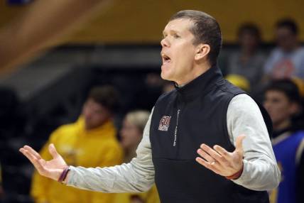 Nov 22, 2022; Pittsburgh, Pennsylvania, USA; Fairleigh Dickinson Knights head coach Tobin Anderson reacts to a foul call on the Knights against the Pittsburgh Panthers during the first half at the Petersen Events Center. Mandatory Credit: Charles LeClaire-USA TODAY Sports