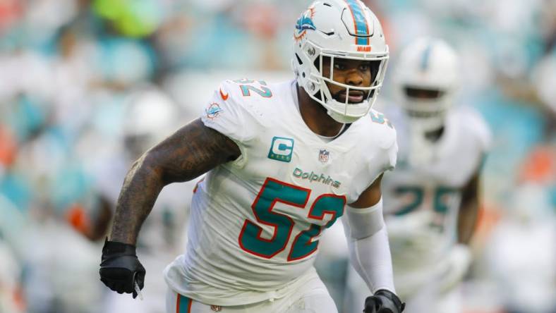 Nov 27, 2022; Miami Gardens, Florida, USA; Miami Dolphins linebacker Elandon Roberts (52) runs off the field during the second quarter against the Houston Texans at Hard Rock Stadium. Mandatory Credit: Sam Navarro-USA TODAY Sports