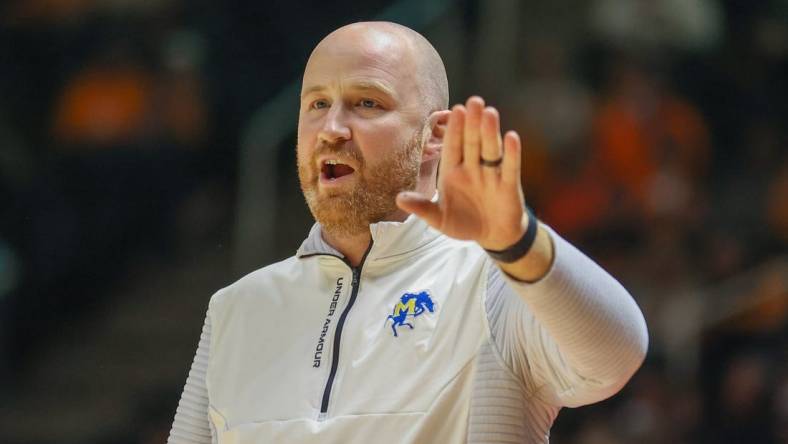 Nov 30, 2022; Knoxville, Tennessee, USA; McNeese State Cowboys head coach John Aiken during the game against the Tennessee Volunteers at Thompson-Boling Arena. Mandatory Credit: Randy Sartin-USA TODAY Sports