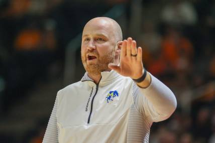 Nov 30, 2022; Knoxville, Tennessee, USA; McNeese State Cowboys head coach John Aiken during the game against the Tennessee Volunteers at Thompson-Boling Arena. Mandatory Credit: Randy Sartin-USA TODAY Sports