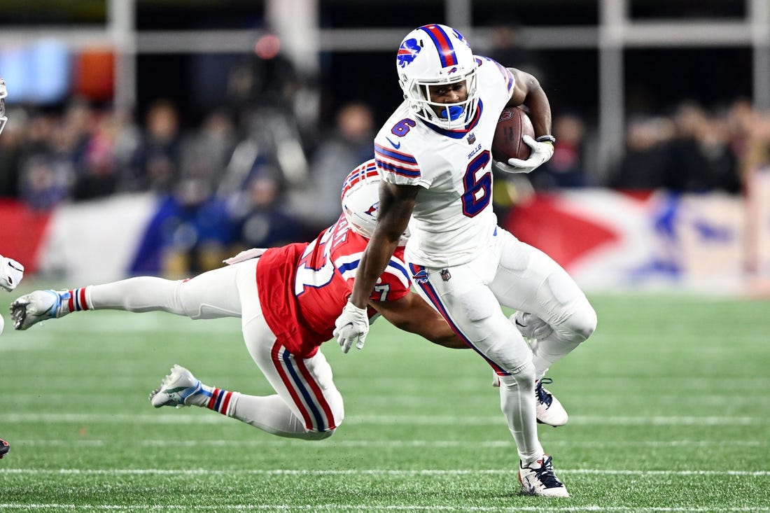 Dec 1, 2022; Foxborough, Massachusetts, USA; Buffalo Bills wide receiver Isaiah McKenzie (6) rushes past New England Patriots cornerback Myles Bryant (27) during the first half at Gillette Stadium. Mandatory Credit: Brian Fluharty-USA TODAY Sports