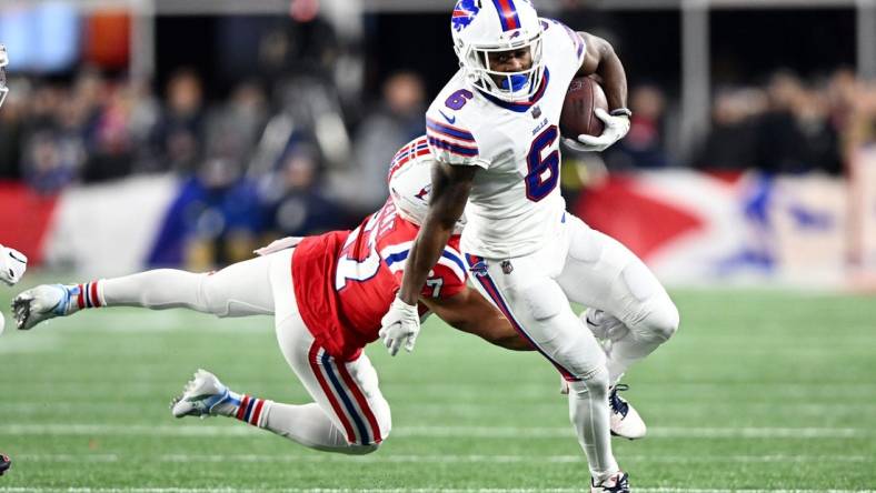 Dec 1, 2022; Foxborough, Massachusetts, USA; Buffalo Bills wide receiver Isaiah McKenzie (6) rushes past New England Patriots cornerback Myles Bryant (27) during the first half at Gillette Stadium. Mandatory Credit: Brian Fluharty-USA TODAY Sports