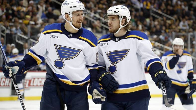 Dec 3, 2022; Pittsburgh, Pennsylvania, USA;  St. Louis Blues left wing Pavel Buchnevich (89) and center Robert Thomas (right) talk during a time-out against the Pittsburgh Penguins in the first period at PPG Paints Arena. Mandatory Credit: Charles LeClaire-USA TODAY Sports