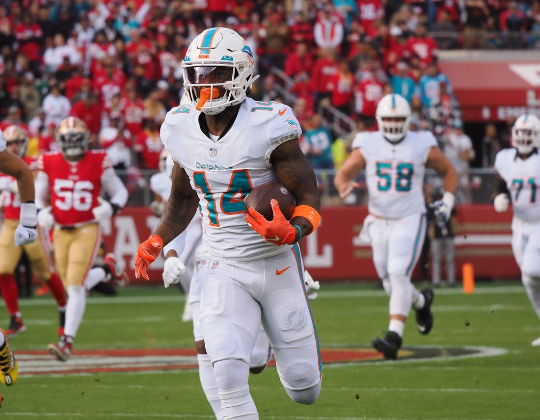 Dec 4, 2022; Santa Clara, California, USA; Miami Dolphins wide receiver Trent Sherfield (14) runs for a touchdown on the opening drive against the San Francisco 49ers during the first quarter at Levi's Stadium. Mandatory Credit: Kelley L Cox-USA TODAY Sports