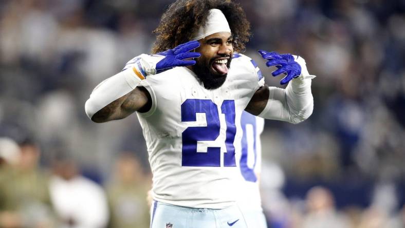 Dec 4, 2022; Arlington, Texas, USA;  Dallas Cowboys running back Ezekiel Elliott (21) celebrates a touchdown in the fourth quarter against the Indianapolis Colts at AT&T Stadium. Mandatory Credit: Tim Heitman-USA TODAY Sports