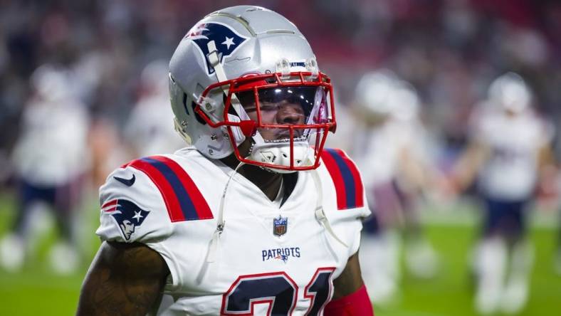 Dec 12, 2022; Glendale, Arizona, USA; New England Patriots cornerback Jonathan Jones (31) against the Arizona Cardinals at State Farm Stadium. Mandatory Credit: Mark J. Rebilas-USA TODAY Sports