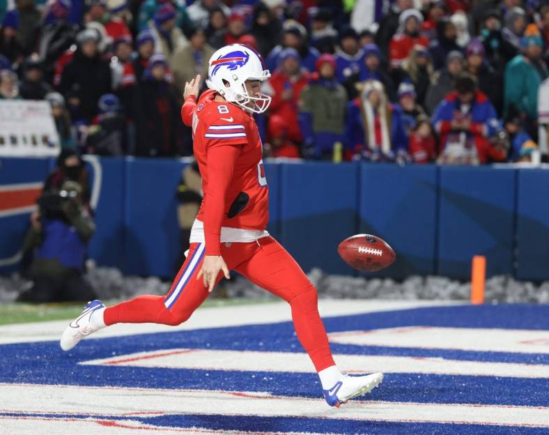 Bills punter Sam Martin kicks out of his own end zone.