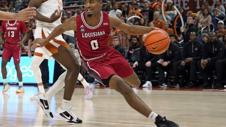 Dec 21, 2022; Austin, Texas, USA; Louisiana-Lafayette Ragin' Cajuns guard Themus Fulks (0) looks to pass the ball during the second half against the Texas Longhorns at Moody Center. Mandatory Credit: Scott Wachter-USA TODAY Sports