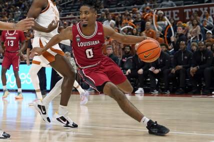 Dec 21, 2022; Austin, Texas, USA; Louisiana-Lafayette Ragin' Cajuns guard Themus Fulks (0) looks to pass the ball during the second half against the Texas Longhorns at Moody Center. Mandatory Credit: Scott Wachter-USA TODAY Sports