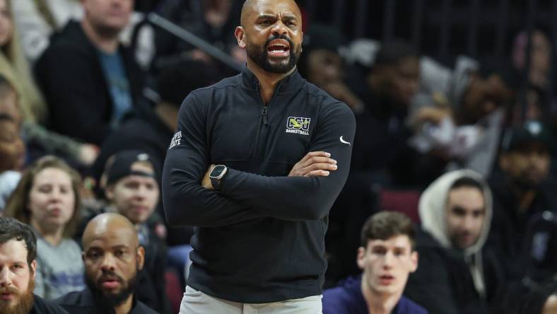 Dec 30, 2022; Piscataway, New Jersey, USA; Coppin State Eagles head coach Juan Dixon reacts during the first half against the Rutgers Scarlet Knights at Jersey Mike's Arena. Mandatory Credit: Vincent Carchietta-USA TODAY Sports