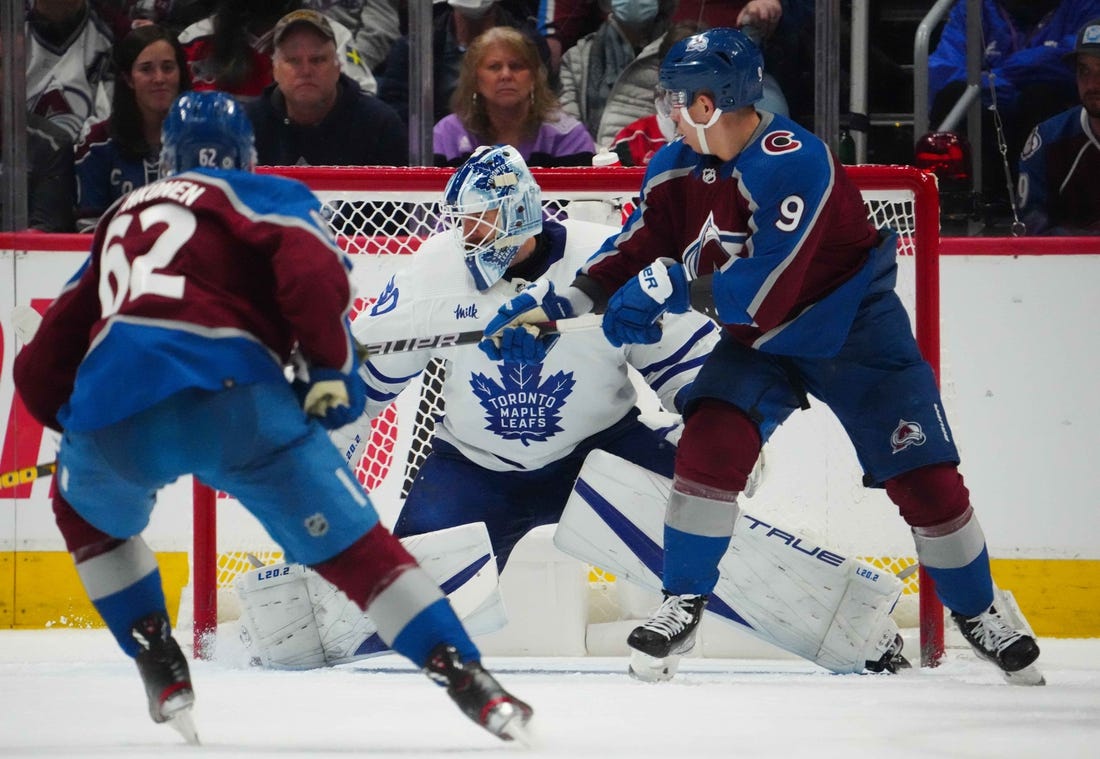 Dec 31, 2022; Denver, Colorado, USA; Toronto Maple Leafs goaltender Matt Murray (30) makes a save against Colorado Avalanche center Evan Rodrigues (9) in the third period at Ball Arena. Mandatory Credit: Ron Chenoy-USA TODAY Sports