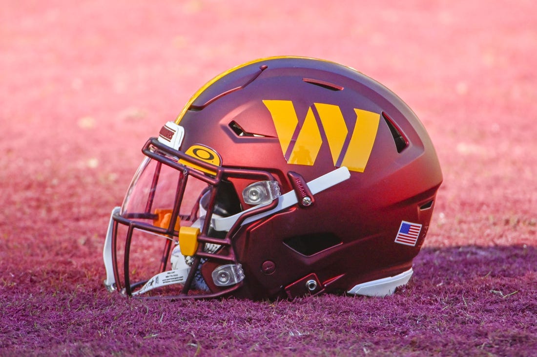 Jan 1, 2023; Landover, Maryland, USA; Washington Commanders helmet on the field before the game against the Cleveland Browns at FedExField. Mandatory Credit: Brad Mills-USA TODAY Sports