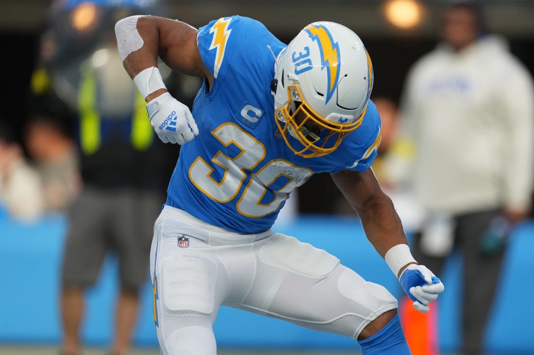 Jan 1, 2023; Inglewood, California, USA; Los Angeles Chargers running back Austin Ekeler (30) celebrates after a touchdown against the Los Angeles Rams in the first half at SoFi Stadium. Mandatory Credit: Kirby Lee-USA TODAY Sports