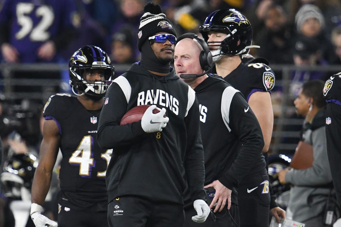 Jan 1, 2023; Baltimore, Maryland, USA;  Baltimore Ravens quarterback Lamar Jackson (8) stands on the sideline during the first half against the Pittsburgh Steelers at M&T Bank Stadium. Mandatory Credit: Tommy Gilligan-USA TODAY Sports